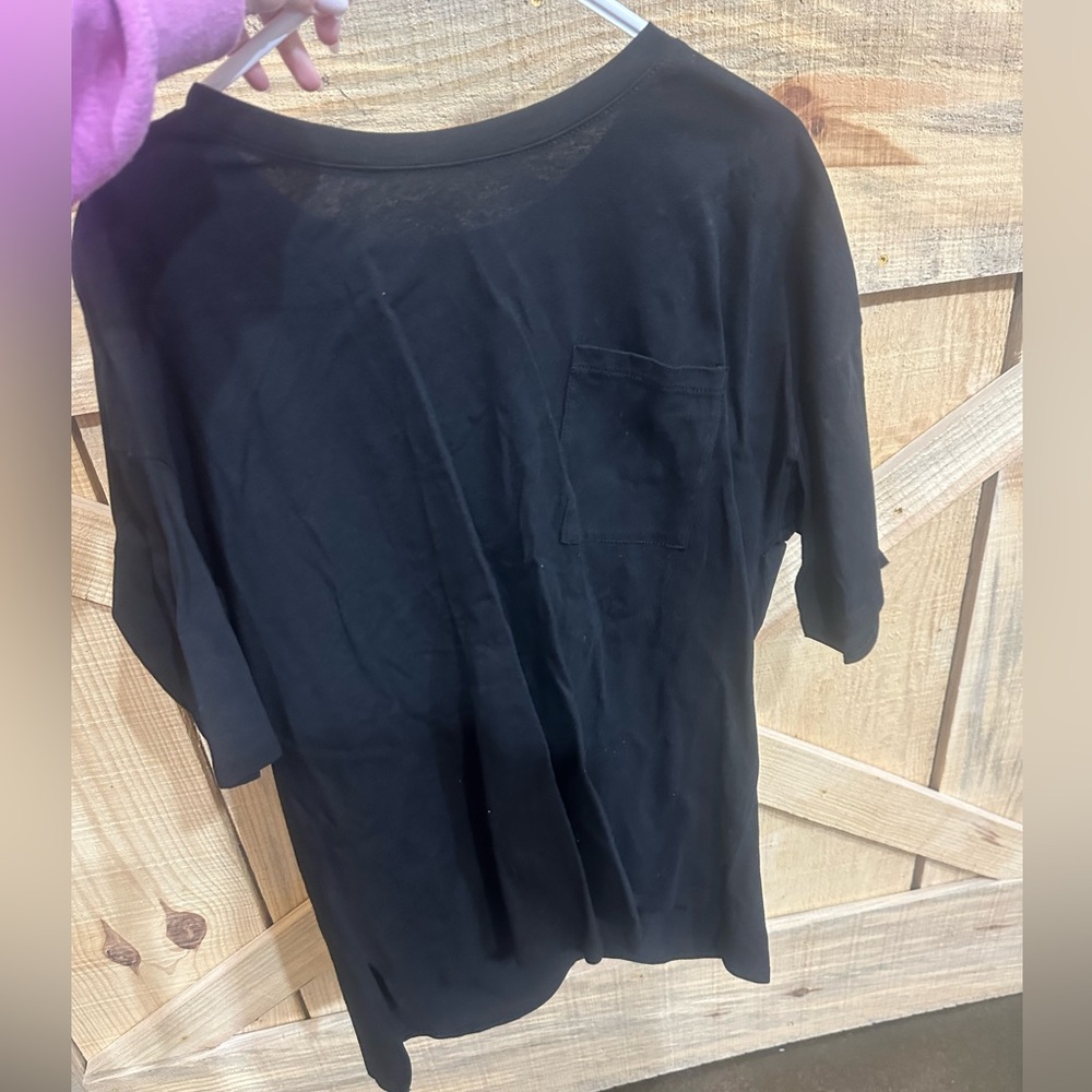 Black western boutique, top with friends and stars on the back